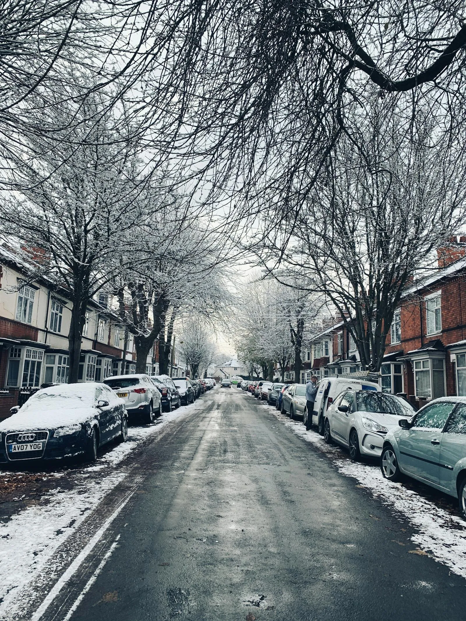 Red-brick terraced houses on a Leicester street