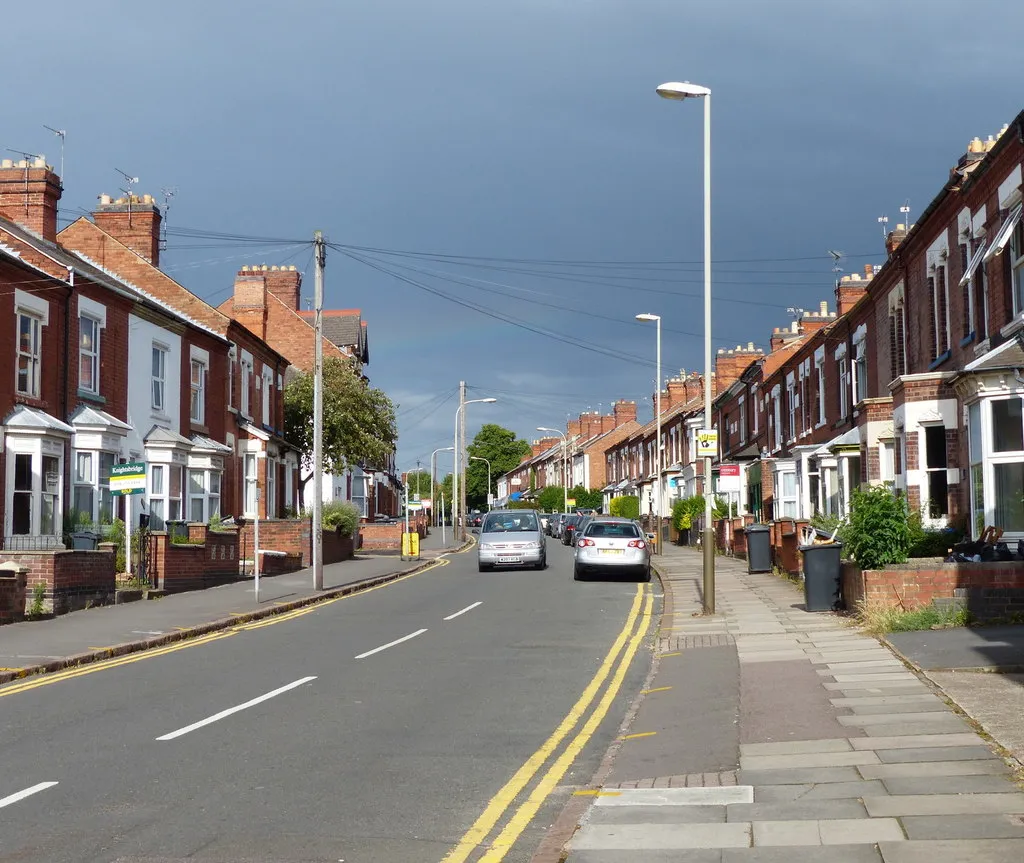 Bay-fronted Victorian terraces along a wide Leicester street — the city's most common home for a heat pump conversion.